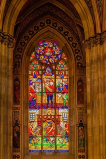 Colourful window in the neo-gothic votive church, Vienna, Austria