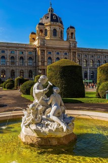 One of four Triton and Najad fountains on Maria-Theresien-Platz, behind the Natural History Museum,