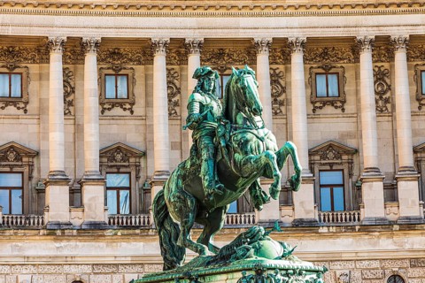Monument to Prince Eugene, behind it the historic façade of the New Hofburg Imperial Palace,