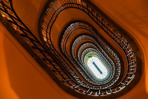 Staircase in an old Viennese house, view from below, Vienna, Austria