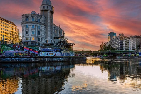 Urania Observatory and Danube Canal at sunset, Vienna, Austria