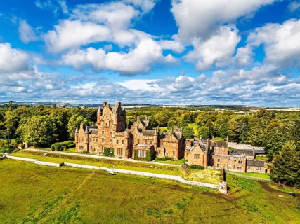 Ayton Castle from a drone, Ayton, Eyemouth, Scottish Borders, Scotland, UK