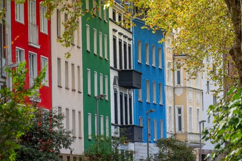 Residential buildings in Düsseldorf-Bilk, facades with different colors, rental apartments, past,