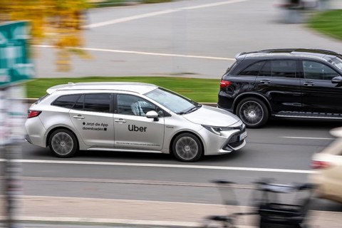 Uber rental car, drives past taxis, Düsseldorf-Bilk train station, taxi stand, competition, North