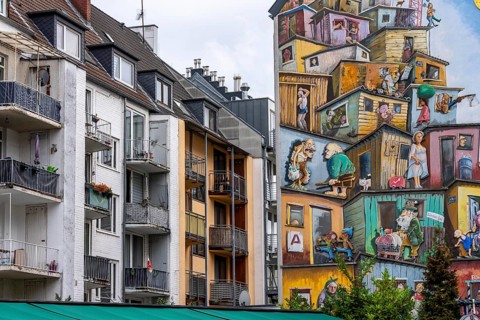 Residential buildings in Düsseldorf-Bilk, Merowingerstraße, mural entitled Wirtschaftswunder, since