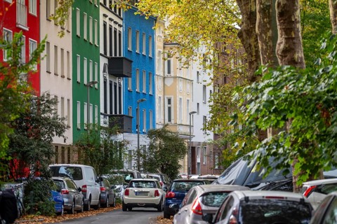 Residential buildings in Düsseldorf-Bilk, facades with different colors, rental apartments, past,