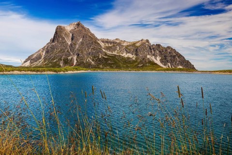 The panoramic lake on Saloberkopf with the Großer Widderstein mountain in the background and