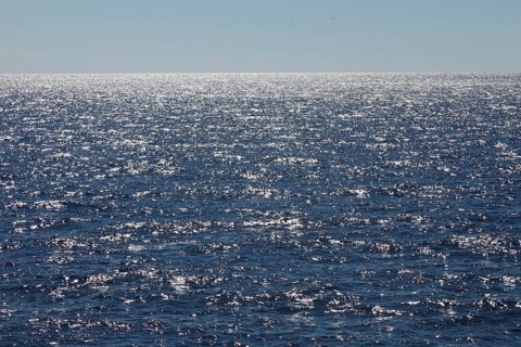 Aegean Sea in sparkling sunlight, Cyclades, Greece