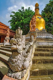 Golden stupa Buddhist element building symbol for Buddha and his teaching Dharma, in the foreground
