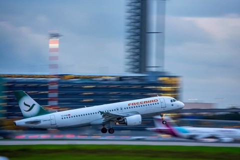 Freebird Airbus A320, taking off from Düsseldorf Airport, Air Traffic Control Tower, North