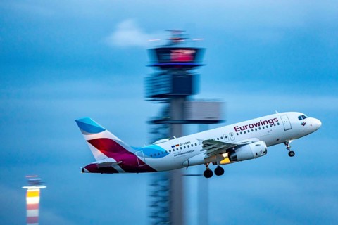 Eurowings Airbus A319 taking off from Düsseldorf Airport, Air Traffic Control Tower, North