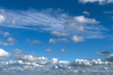 Almost overcast sky with clouds cloud field Cumulus right above Stratocumulus above in the