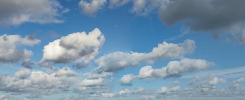 White clouds driven by approaching storm Cumulus above Stratocumulus loose to thick cloudiness