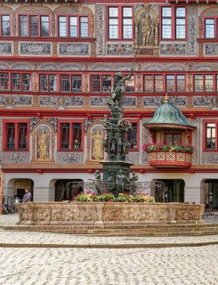 Market square with town hall and Neptune fountain with Neptune and trident from the Renaissance,