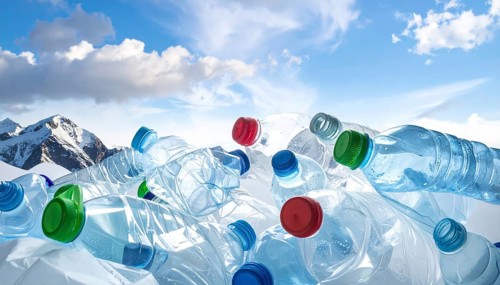 Crushed plastic water bottle waste in a wild landscape, symbol for nature protection, waste
