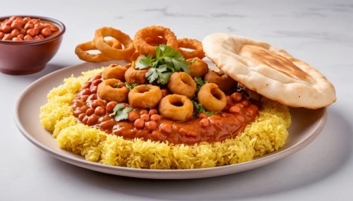 This flavorful dish features a vibrant yellow rice base, topped with savory beans and crispy onion