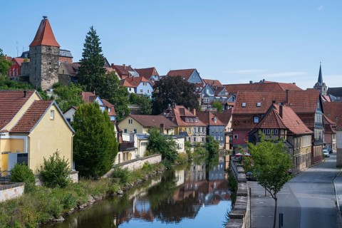 View of the old town on the river Hasslach, reflection, Kronach, Upper Franconia, Franconia,