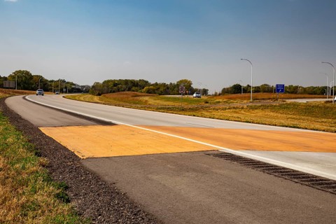Blue Earth, Minnesota - A 'Golden Stripe' of yellow pavement marks the spot where Interstate 90 was