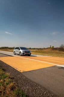 Blue Earth, Minnesota - A 'Golden Stripe' of yellow pavement marks the spot where Interstate 90 was