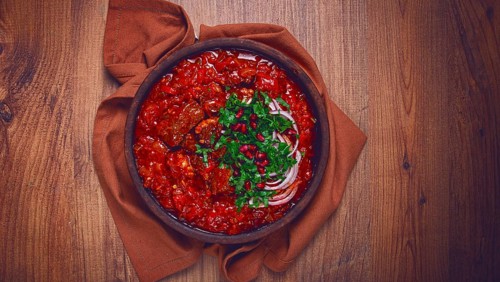 Chashushuli, a traditional Georgian dish, spicy, stewed meat with tomatoes and spices, homemade, no