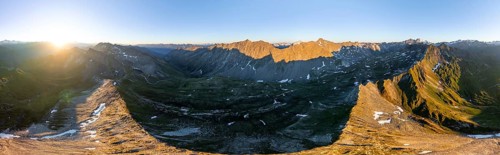 Sunrise 360° Alpine panorama, aerial view of Bachlenkenkopf, summit of the Großvenediger, Venediger