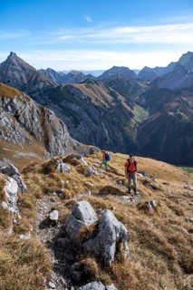 Two hikers on hiking trail, hiking to Gamsjoch, down the Ahornboden valley, eastern Karwendel,