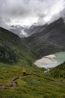 Hikers in a cloudy mountain landscape, Margaritzen Reservoir, Grossglockner High Alpine Road, Hohe