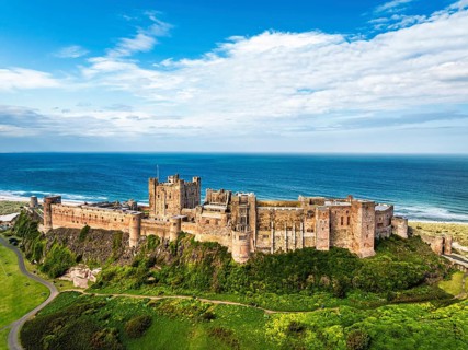 Bamburgh Castle from a drone, Northumberland, Northeast Coast, England, United Kingdom