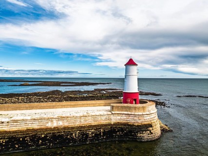Berwick Pier and Lighthouse from a drone, Berwick-upon-Tweed, England, United Kingdom