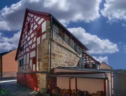 Historic half-timbered house with integrated city wall, built in 1553, reconstructions in 1660 and