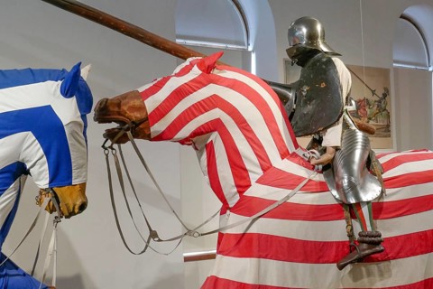 Knight in knight armor on horse, armory, interior view, Ambras Castle, Innsbruck, Tyrol, Austria