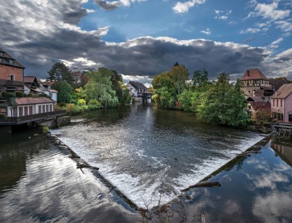 View of the Pegnitz with the river weir, on the right the historic Jewish Tower, Lauf an der