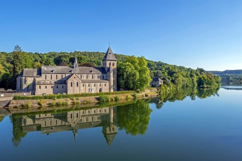 Abbey Church of St Peter, Église abbatiale Saint-Pierre d'Hastière, Hastière-par-delà reflected in