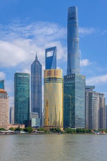 Huangpu River and Lujiazui skyline with skyscrapers, Shanghai Tower and Jin Mao Tower in financial