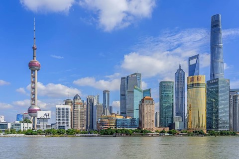 Huangpu River and Lujiazui skyline with skyscrapers, Shanghai Tower and Oriental Pearl Tower in