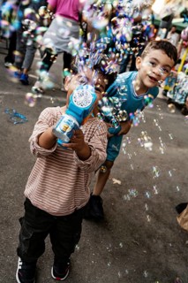 Soap bubbles, kids, boys, Arles, France