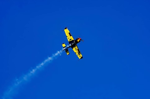 A Votec 351 sport aircraft from the Swiss MSW Aviation AG with registration HB-YMV during a flight