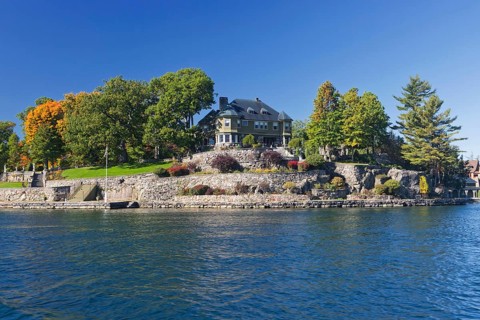 House on a small island in the Saint Lawrence River, 1000 Islands Park, on the borderline the