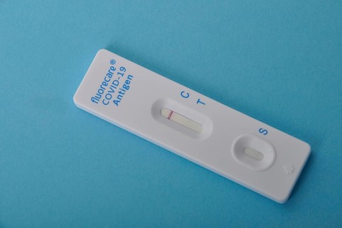 Covid-19 self-test on a blue background