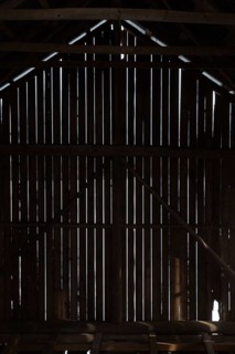 Silhouette of barn wall boards from inside, Junkarsborg, Finland