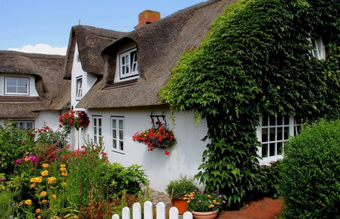 House with thatched roof on Amrum Island, Schleswig-Holstein, Germany