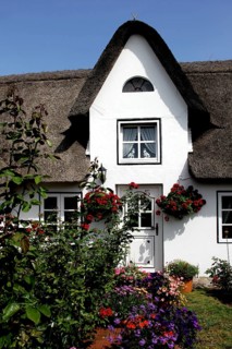 House with thatched roof, Amrum Island, Schleswig-Holstein, Germany