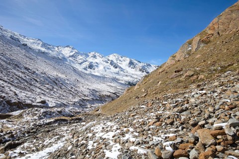 A barren landscape with lots of debris characterizes the high-alpine landscape in South Tyrol,