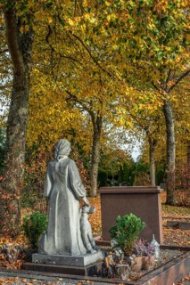 Female figure as a tombstone on a grave in Ystad, Skåne County, Sweden, Scandinavia