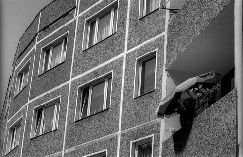 Germany, Halle, 5.8.1992, new building (panel) with balcony and parasol