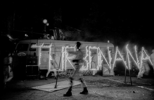 Germany, Berlin, 1.8.1992, fire artist, performing in the courtyard of the occupied building at