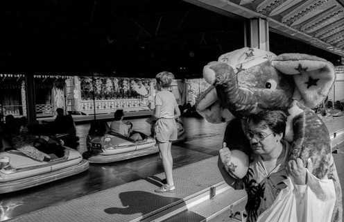 Germany, Berlin, 01.8.1992, hustle and bustle on Marx-Engels-Platz, bumper car, man with caught