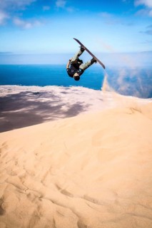 Sandboarding in Alto los Verdes, in Atacama Desert. Iquique, Tarapaca Region, Chile. 19.11.15