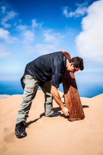 Sandboarder in Alto los Verdes, in Atacama Desert. Iquique, Tarapaca Region, Chile. 19.11.15