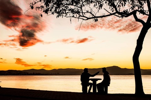 Sidewalk of Beira Mar Norte Avenue at sunset. Florianopolis, Santa Catarina, Brazil